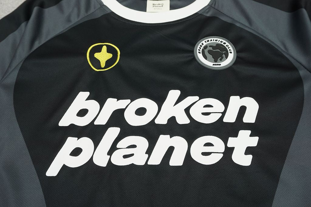Broken planet football shirt